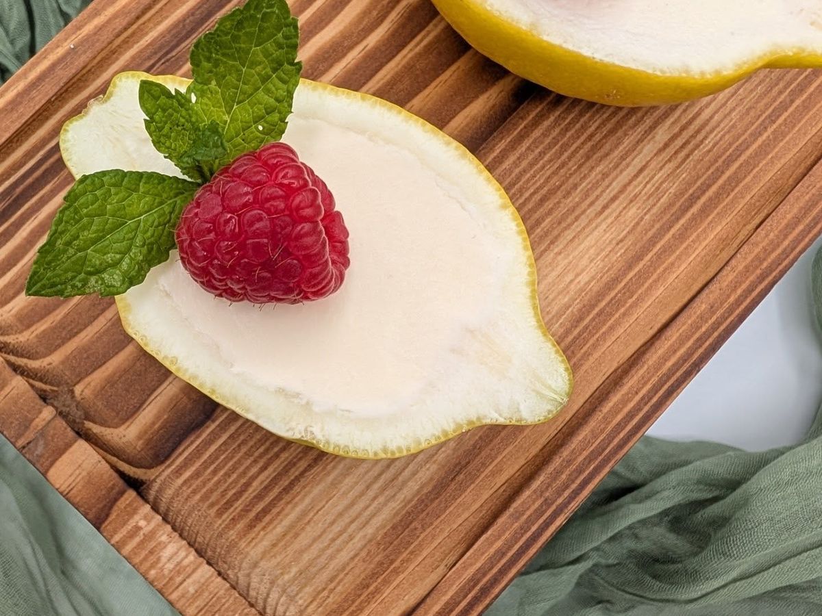 Lemon cheesecake served in a lemon half